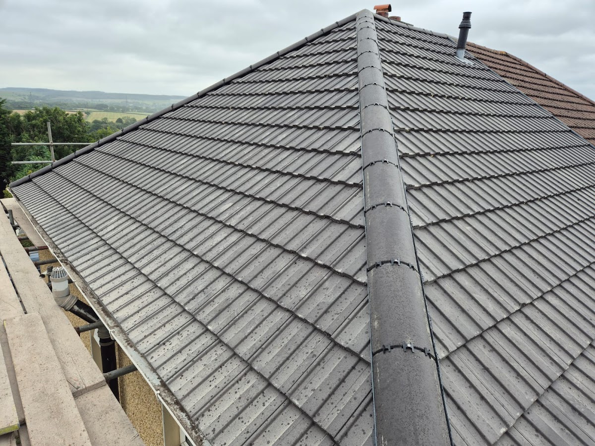 A finished tiled roof completed by Ridgeline Roofing