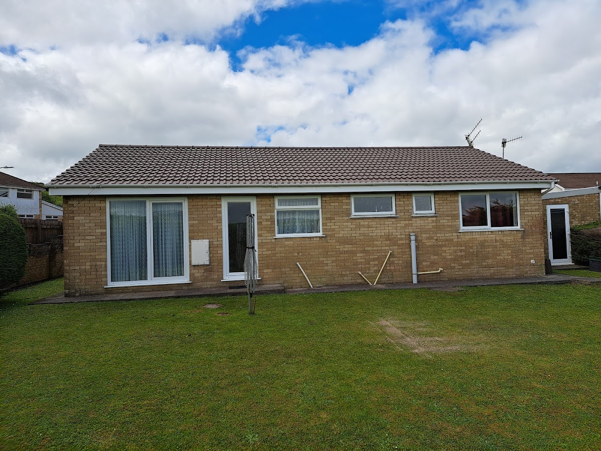 Completed brown tiled bungalow roof, clean and tidy finish